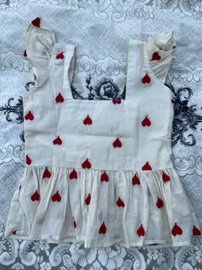 SLEEVELESS TOP WITH RED HEART EMBROIDERY